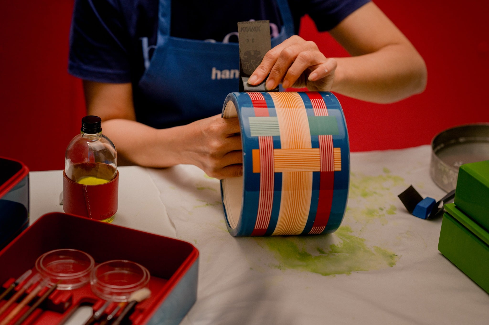 Hanoia artisan carefully polishing lacquer